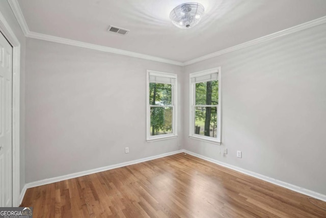 220 Chinkapin Cir SW, South Fulton, GA 30311 - unfurnished room featuring wood finished floors and ornamental molding