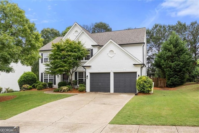 5156 Amberden Hall Dr, Suwanee, GA 30024 - traditional home featuring driveway, an attached garage, and roof with shingles