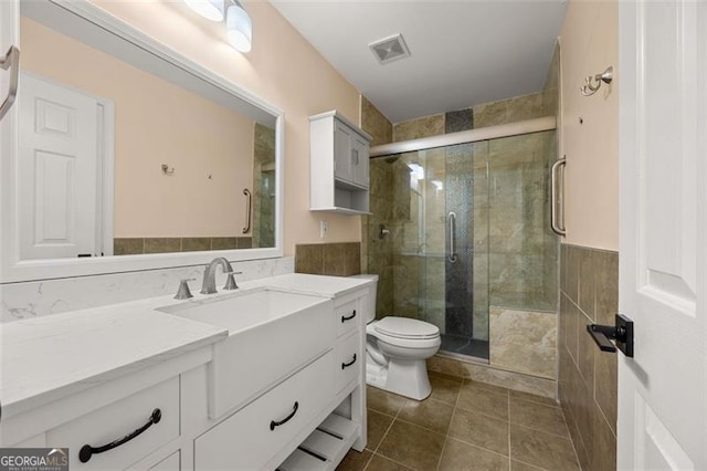 5156 Amberden Hall Dr, Suwanee, GA 30024 - full bathroom featuring vanity, tile patterned floors, and a stall shower