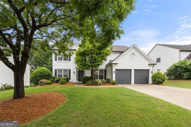 5156 Amberden Hall Dr, Suwanee, GA 30024 - view of front facade with a garage, a front lawn, and driveway