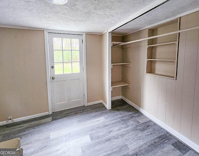 797 Gabbettville Rd, Lagrange, GA 30240 - doorway to outside featuring wood finished floors and a textured ceiling