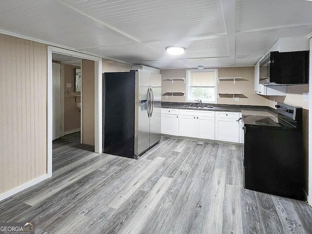797 Gabbettville Rd, Lagrange, GA 30240 - kitchen with black appliances, dark countertops, open shelves, and light wood-type flooring