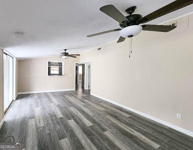 797 Gabbettville Rd, Lagrange, GA 30240 - unfurnished living room with wood finished floors, a textured ceiling, a ceiling fan, and vaulted ceiling