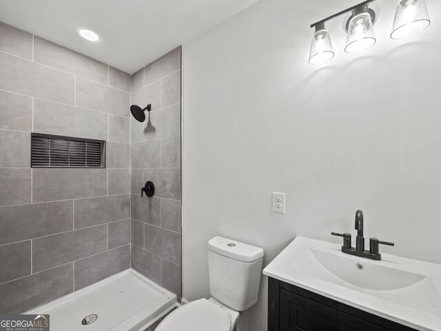 5227 Byers Rd, Gainesville, GA 30504 - bathroom with tiled shower, toilet, and vanity