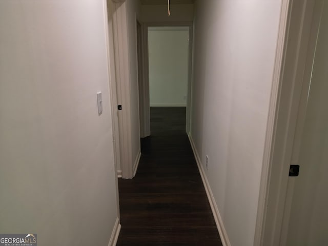 286 Barnes Cir, Commerce, GA 30530 - hallway featuring dark wood-style flooring, baseboards, and attic access