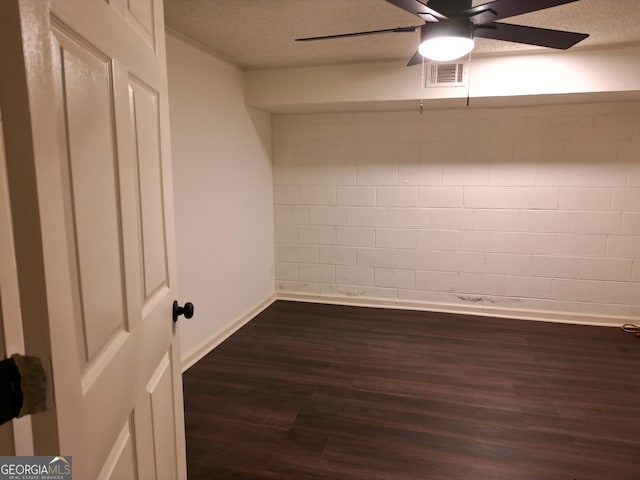 286 Barnes Cir, Commerce, GA 30530 - spare room with ceiling fan, dark wood-style floors, baseboards, and a textured ceiling