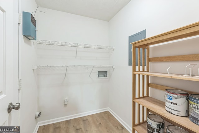 1005 Peachtree Forest Ter, Peachtree Corners, GA 30092 - washroom with hookup for a washing machine, wood finished floors, and baseboards