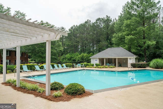 1005 Peachtree Forest Ter, Peachtree Corners, GA 30092 - community pool with a pergola, a patio, and view of wooded area