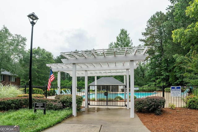 1005 Peachtree Forest Ter, Peachtree Corners, GA 30092 - view of home's community featuring a pergola and a pool