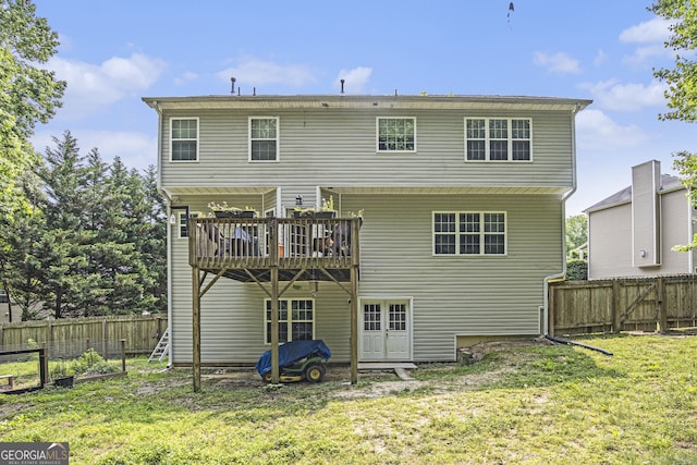 263 Chandler Ridge Dr, Douglasville, GA 30134 - back of property with a deck and a fenced backyard