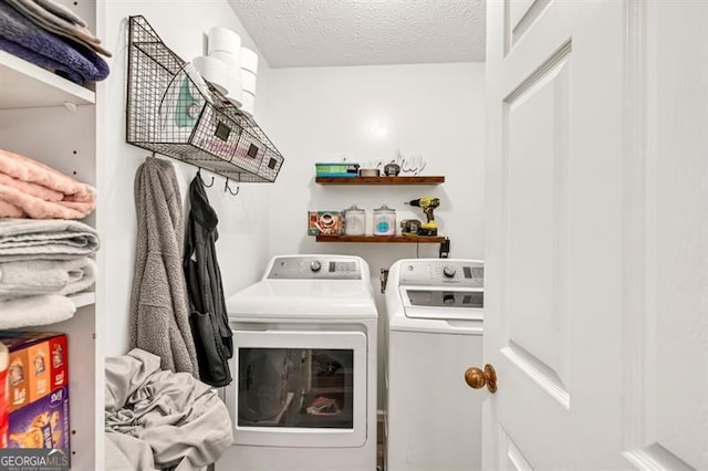 6504 Samoa, Flowery Branch, GA 30542 - laundry room with independent washer and dryer and a textured ceiling