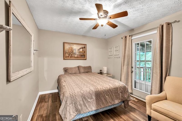 6504 Samoa, Flowery Branch, GA 30542 - bedroom with wood finished floors, baseboards, a textured ceiling, and ceiling fan