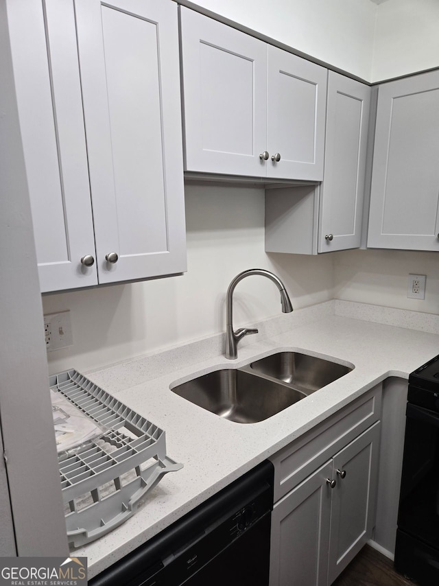 2479 Peachtree Rd NE Unit 902, Atlanta, GA 30305 - kitchen featuring dishwasher, stove, light stone countertops, and gray cabinets