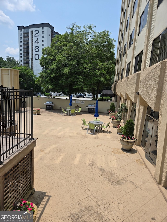 2479 Peachtree Rd NE Unit 902, Atlanta, GA 30305 - surrounding community featuring a patio area