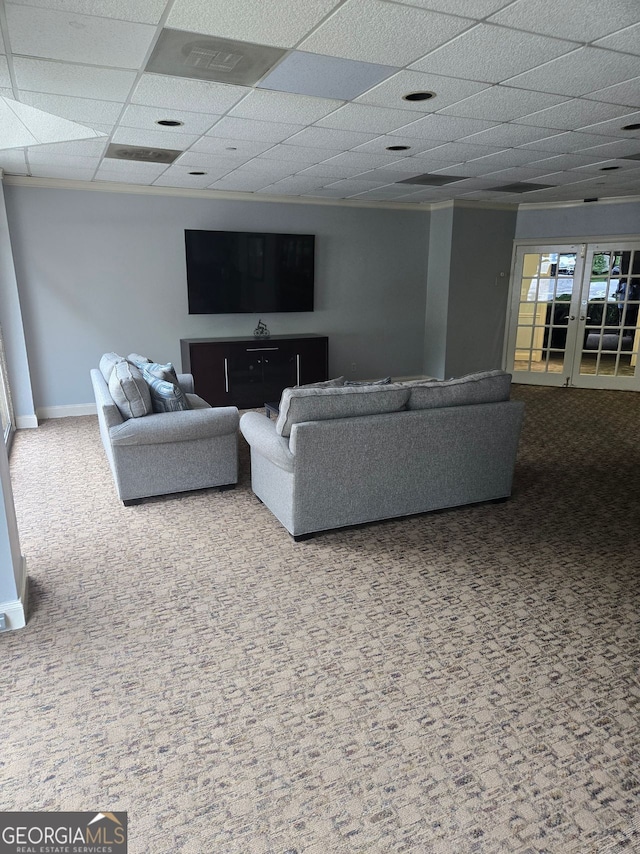 2479 Peachtree Rd NE Unit 902, Atlanta, GA 30305 - carpeted living area with a drop ceiling and baseboards