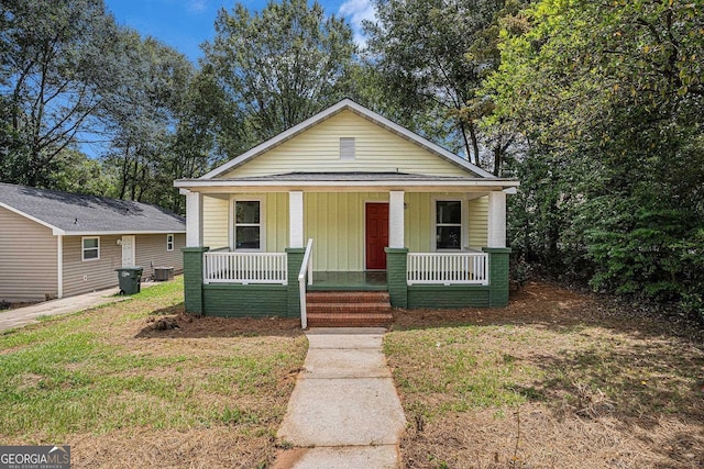 930 W Broad St, Griffin, GA 30223 - view of front facade featuring covered porch and central AC unit