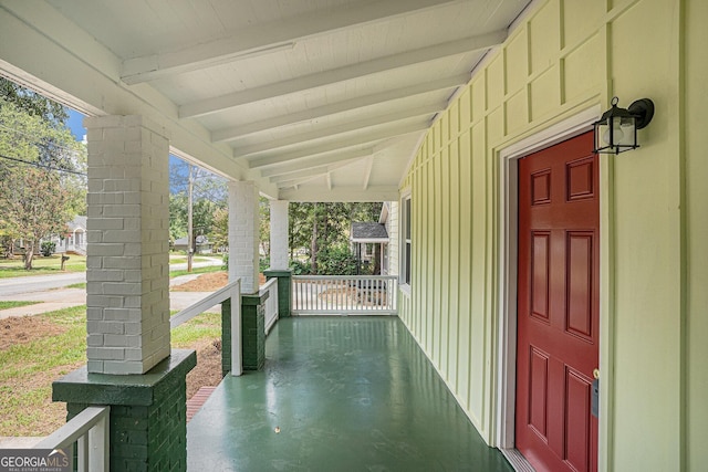 930 W Broad St, Griffin, GA 30223 - view of exterior entry with covered porch and board and batten siding