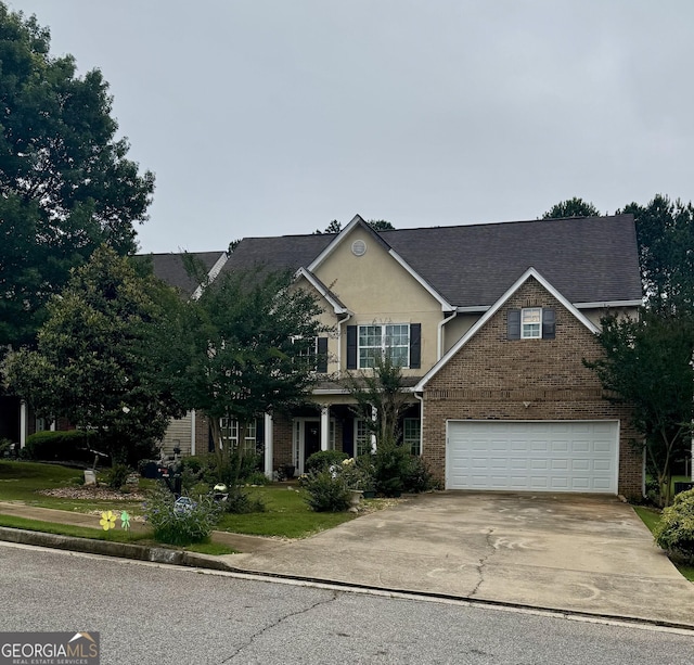 12402 Muir Field Ct, Fayetteville, GA 30215 - view of front of property with an attached garage, concrete driveway, and brick siding