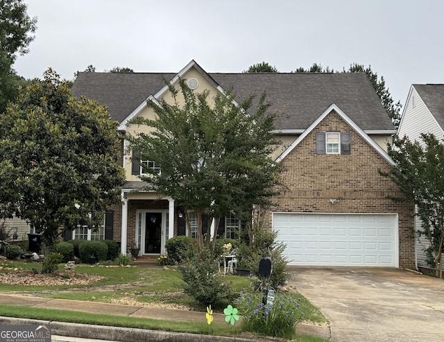 12402 Muir Field Ct, Fayetteville, GA 30215 - obstructed view of property featuring brick siding, driveway, an attached garage, and roof with shingles