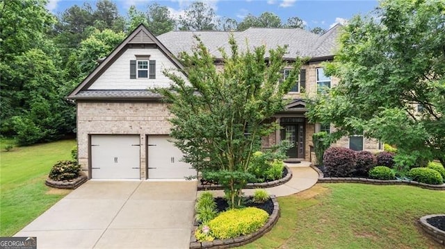 2040 Bloomfield Ct, Cumming, GA 30041 - view of front of property featuring a front yard, a garage, concrete driveway, and brick siding