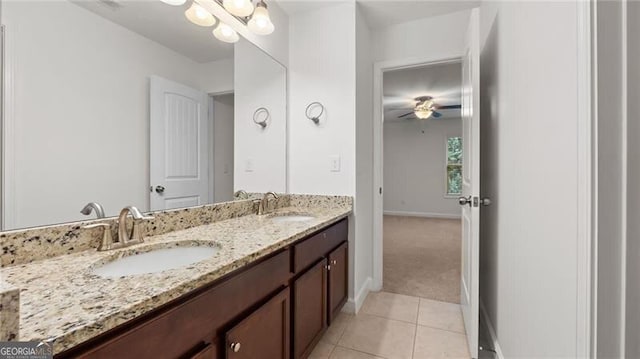 2040 Bloomfield Ct, Cumming, GA 30041 - bathroom featuring double vanity, tile patterned flooring, baseboards, and ceiling fan
