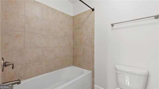 2040 Bloomfield Ct, Cumming, GA 30041 - bathroom featuring toilet and tub / shower combination