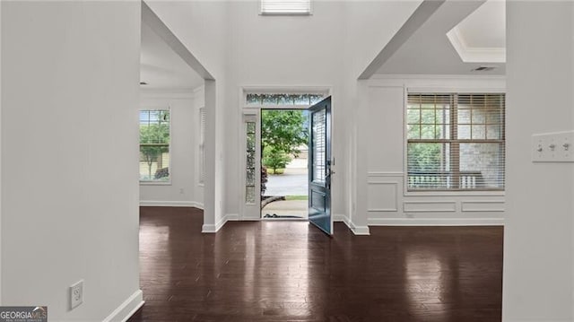 2040 Bloomfield Ct, Cumming, GA 30041 - entrance foyer with ornamental molding, wood finished floors, and baseboards