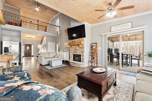 150 Crestview Rd, Jackson, GA 30233 - living area with a ceiling fan, wood ceiling, wood finished floors, ornamental molding, and high vaulted ceiling