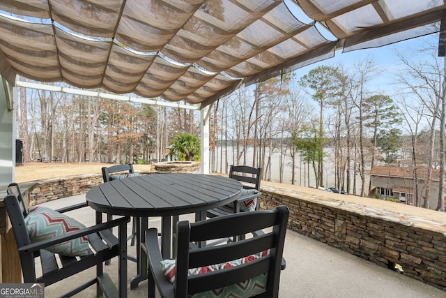 150 Crestview Rd, Jackson, GA 30233 - view of patio / terrace with outdoor dining area, a pergola, and a water view