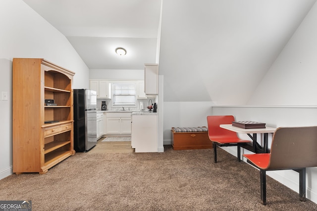 150 Crestview Rd, Jackson, GA 30233 - home office with lofted ceiling, light colored carpet, a sink, and baseboards