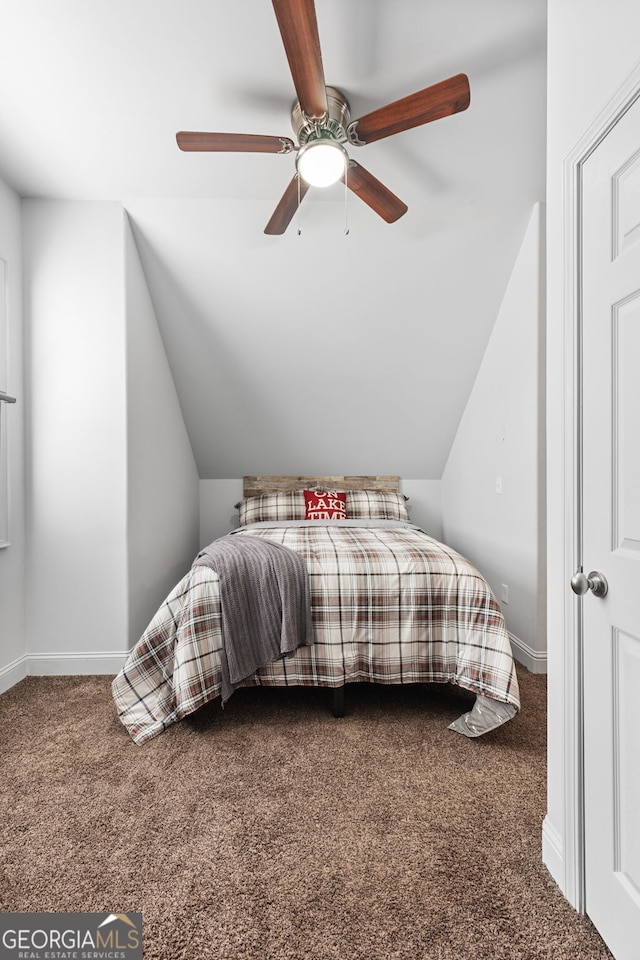 150 Crestview Rd, Jackson, GA 30233 - bedroom with carpet floors, vaulted ceiling, baseboards, and a ceiling fan