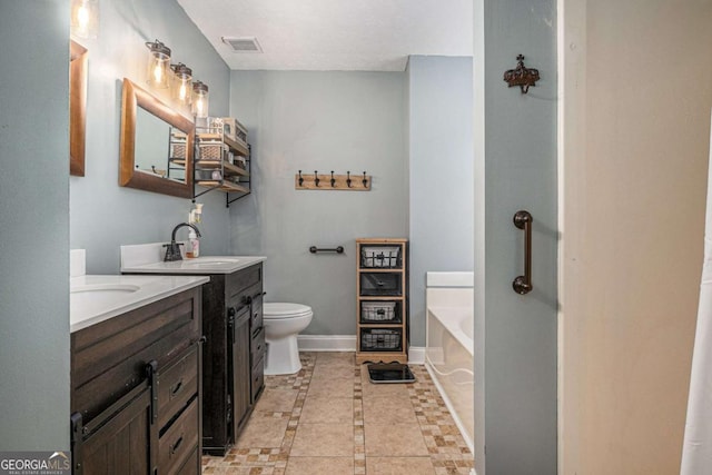 270 Meadow View Dr, Grayson, GA 30017 - full bathroom featuring a garden tub, two vanities, toilet, baseboards, and inlaid floor details
