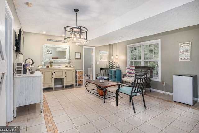 270 Meadow View Dr, Grayson, GA 30017 - dining room featuring light tile patterned floors, a chandelier, a textured ceiling, recessed lighting, and baseboards