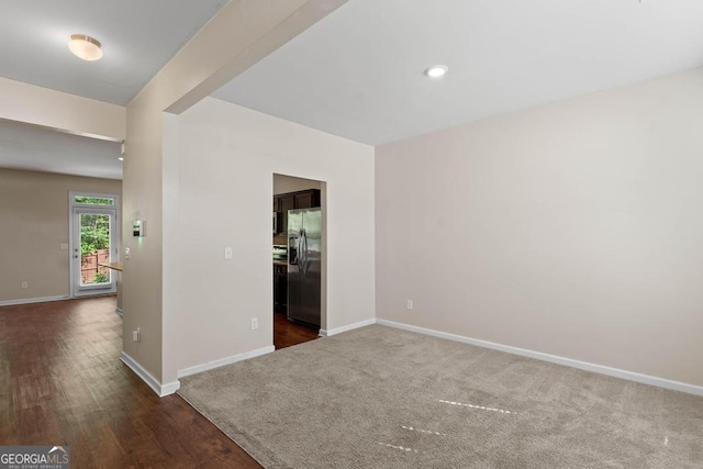 11755 Lovejoy Crossing Blvd, Hampton, GA 30228 - unfurnished room featuring baseboards and dark wood-style floors