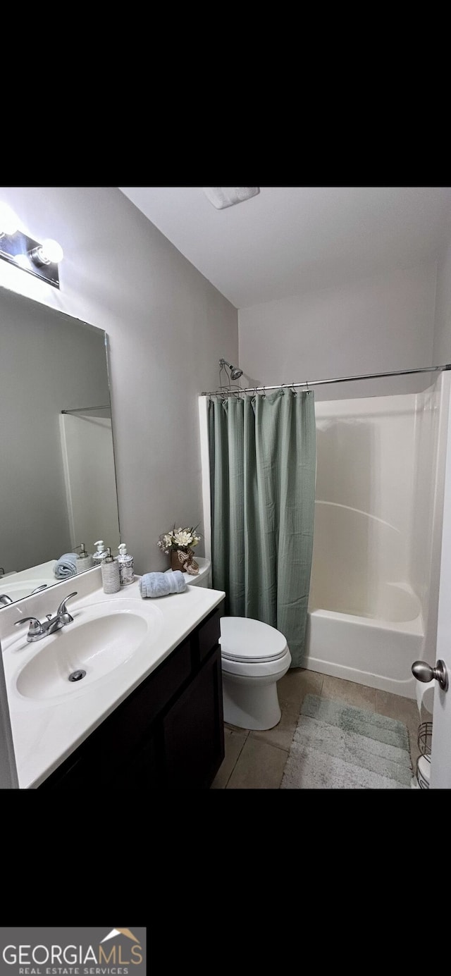 4241 Swamp Cypress Trl, Gainesville, GA 30504 - bathroom featuring vanity, shower / bath combo with shower curtain, and tile patterned floors