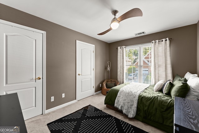 1504 Oglethorpe Dr, Suwanee, GA 30024 - bedroom featuring carpet floors and a ceiling fan