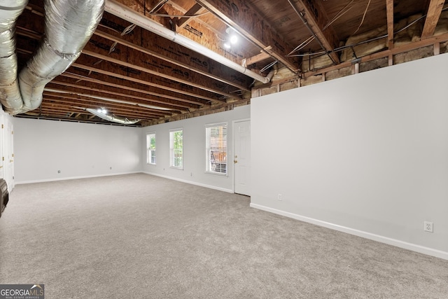 1504 Oglethorpe Dr, Suwanee, GA 30024 - basement featuring carpet floors and baseboards