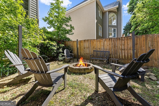 1504 Oglethorpe Dr, Suwanee, GA 30024 - view of yard featuring a fire pit