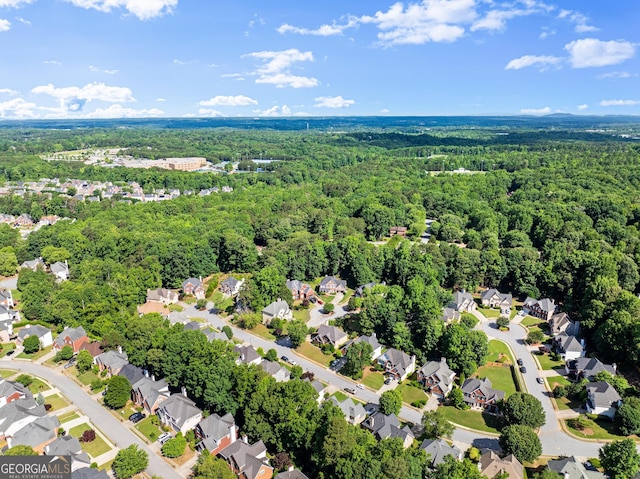 1504 Oglethorpe Dr, Suwanee, GA 30024 - aerial view of residential area featuring a heavily wooded area
