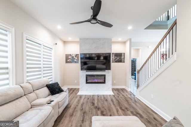 5490 Bent Grass Way, Douglasville, GA 30135 - living room featuring plenty of natural light, wood finished floors, a ceiling fan, and recessed lighting
