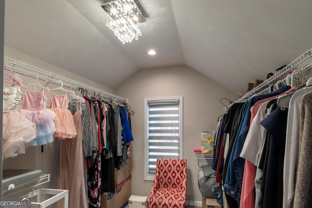 5490 Bent Grass Way, Douglasville, GA 30135 - spacious closet with lofted ceiling and a chandelier