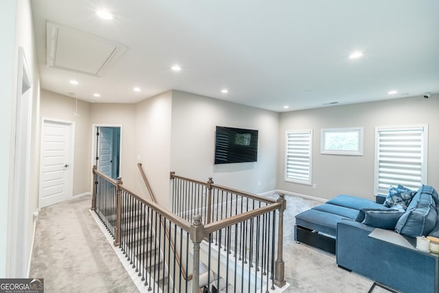 5490 Bent Grass Way, Douglasville, GA 30135 - hall with attic access, an upstairs landing, light colored carpet, recessed lighting, and baseboards