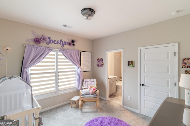 5490 Bent Grass Way, Douglasville, GA 30135 - bedroom featuring light carpet, baseboards, and ensuite bath