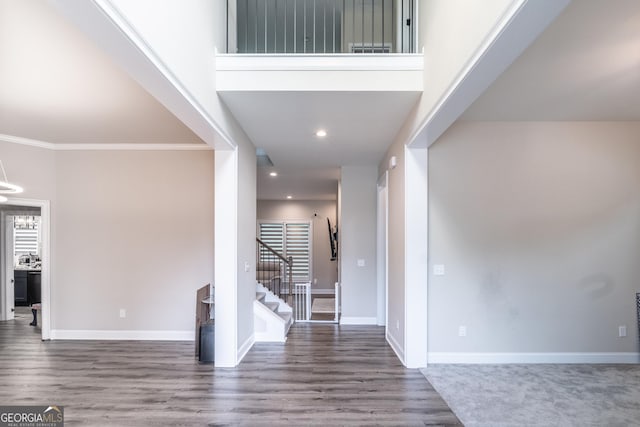 5490 Bent Grass Way, Douglasville, GA 30135 - foyer featuring stairs, baseboards, wood finished floors, recessed lighting, and ornamental molding