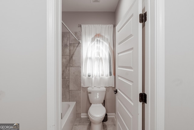 5490 Bent Grass Way, Douglasville, GA 30135 - bathroom featuring toilet, tile patterned flooring, and shower / bathtub combination
