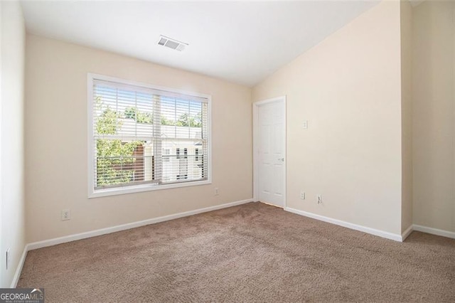 3068 Lauren Parc Rd, Decatur, GA 30032 - carpeted spare room with baseboards and vaulted ceiling
