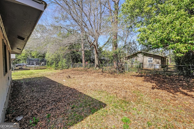 106 Vickie Dr, Warner Robins, GA 31093 - view of yard featuring a trampoline