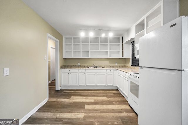 758 King Rd, Jonesboro, GA 30236 - kitchen featuring white appliances, open shelves, wood finished floors, white cabinetry, and light stone counters