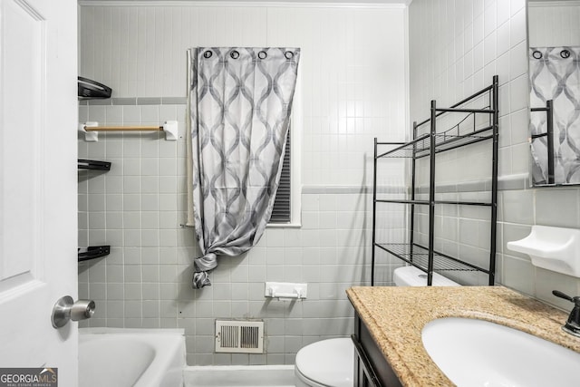 758 King Rd, Jonesboro, GA 30236 - full bath with tile walls, vanity, and toilet