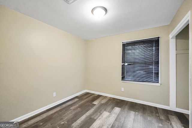 758 King Rd, Jonesboro, GA 30236 - spare room with baseboards and dark wood finished floors